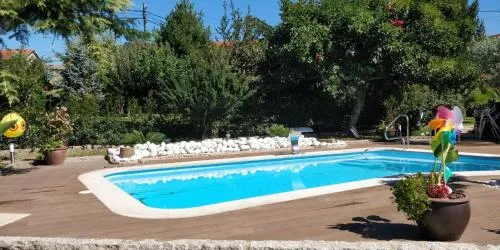 Piso independiente en casa con jardín, piscina y barbacoa privados